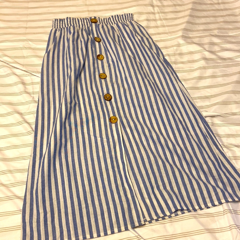 Vertical striped light blue and white button up elastic waste squirt